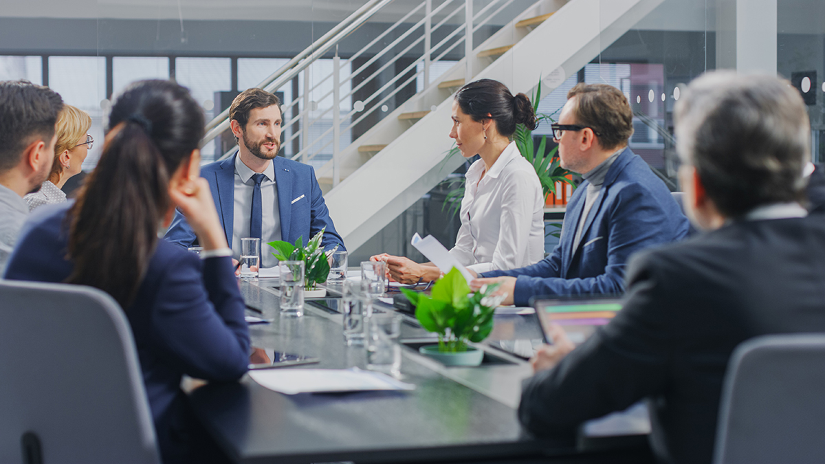 Executive leaders engaged in a laboratory consulting project.
